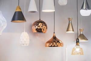 Various hanging lights against a white background.